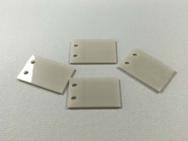 Aluminum nitride ceramic insulating gasket